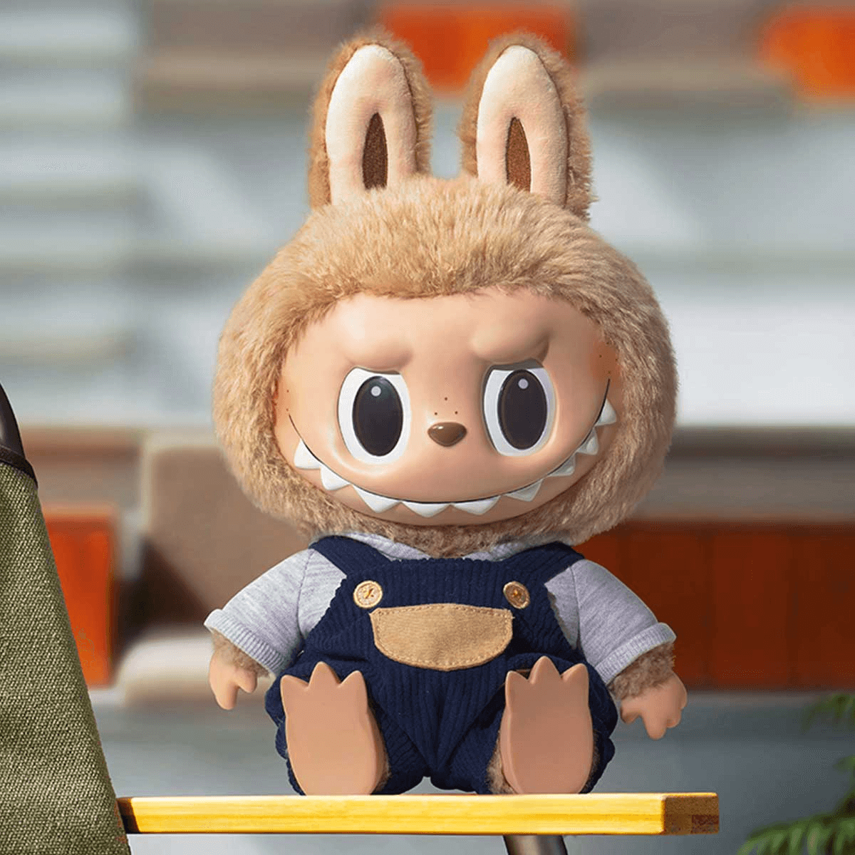 A joyful collector holding up their favorite Labubu figure, smiling