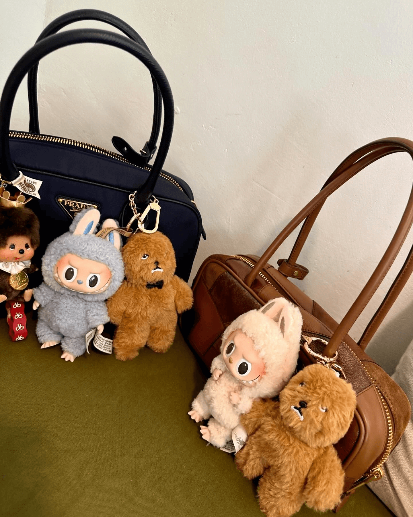 A Labubu doll styled as a fashion accessory by a celebrity